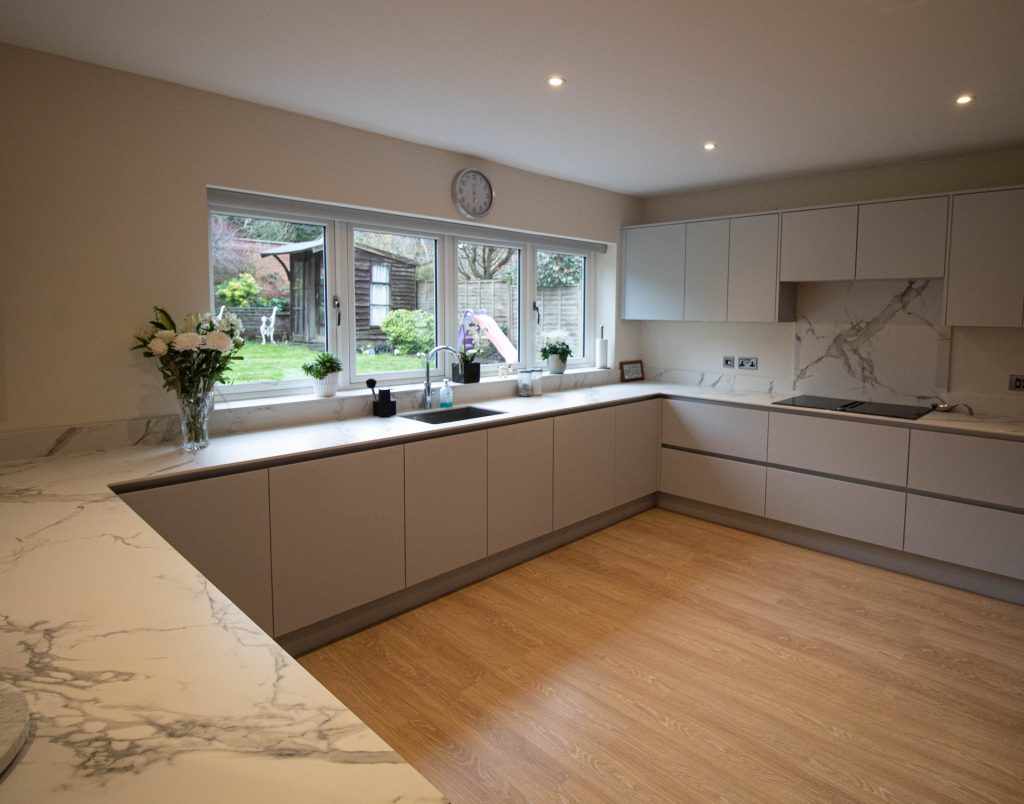 Light grey handle-less kitchen, Noble Kitchens