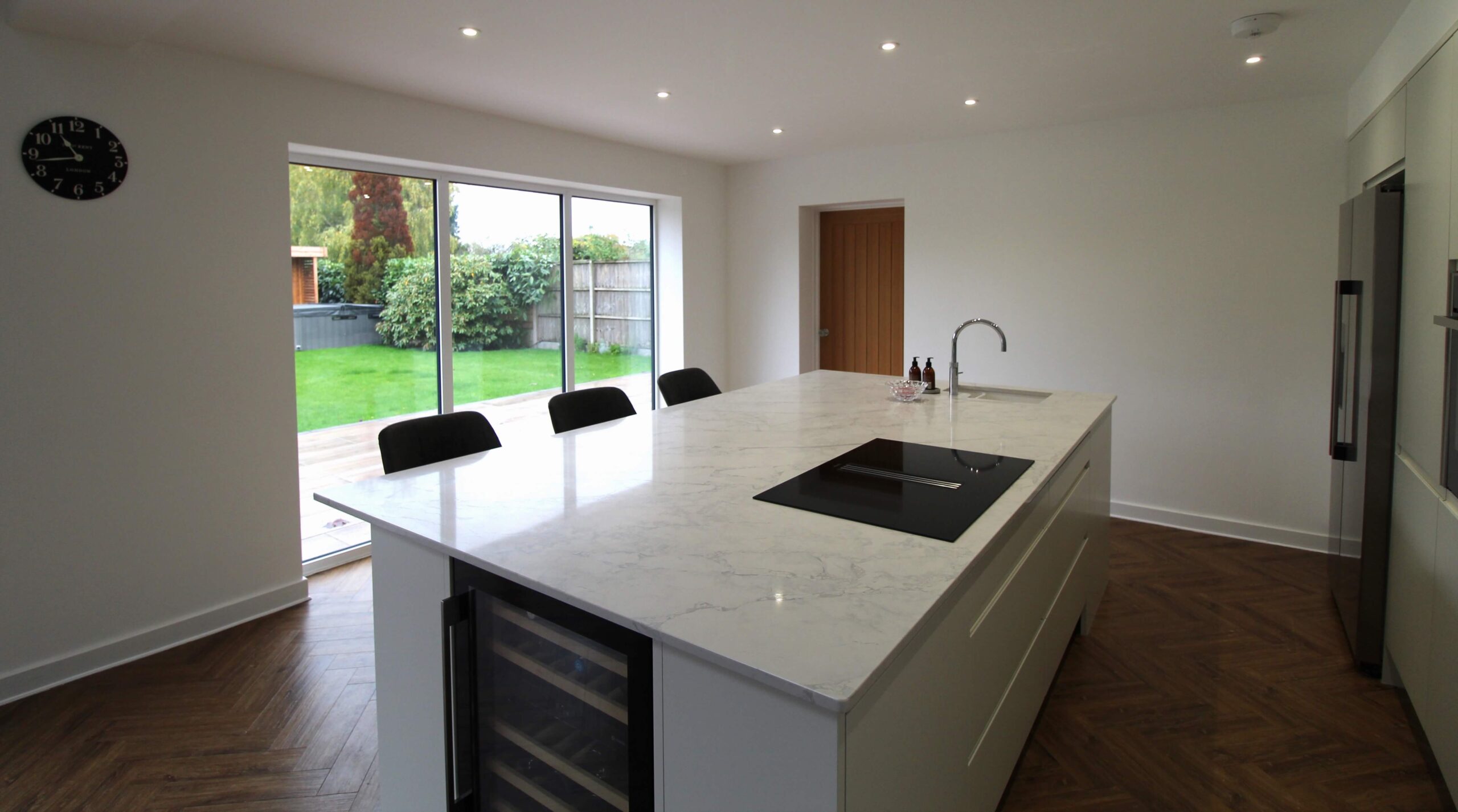 Kitchen island with quartz worktop and wine cabinet