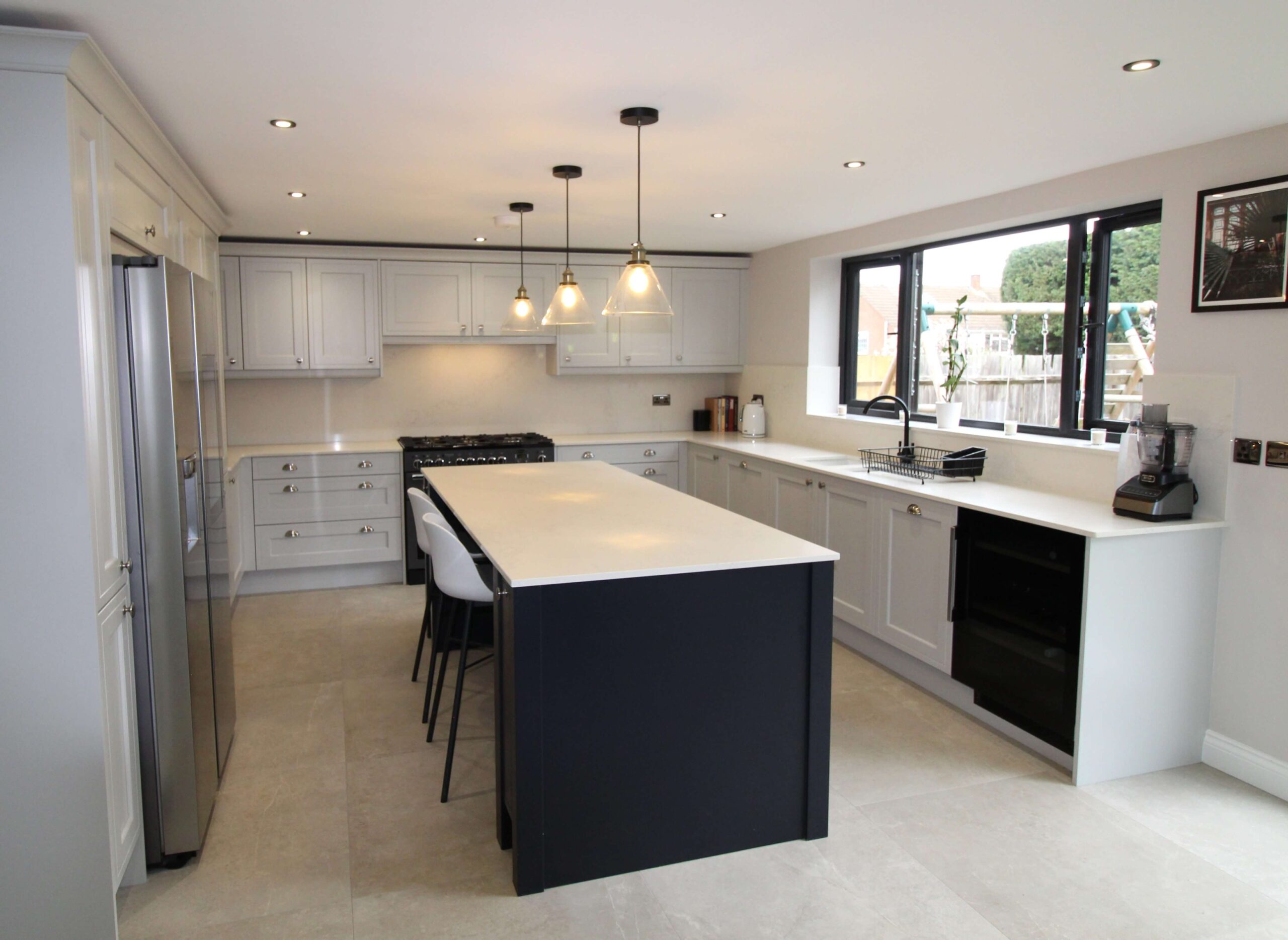 Painted mock inframe kitchen in light grey and indigo